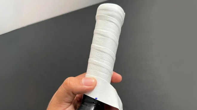 Dùng kéo cắt bỏ phần dây cuốn còn thừa nếu đã quấn xong